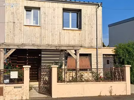 maison 87m²  véranda et jardin dans rue calme