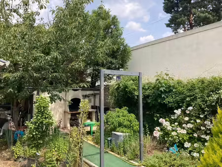 appartement t3 donnant sur jardin avec véranda et terrasse