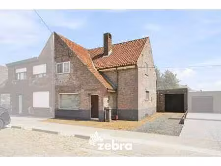 halfopen woning in tuinwijk te koop in roeselare!