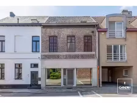 handelspand met ruime woonst te centrum melle