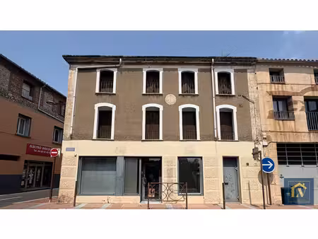 immeuble de rapport comprenant un local commercial et 4 appartements
