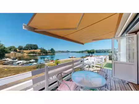 terrain + mobil-home avec emplacement exceptionnel en 1ère ligne sur le lac de pareloup
