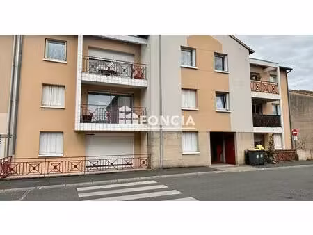 bel appartement 3 pièces proche mairie et commerces avec grand garage privatif