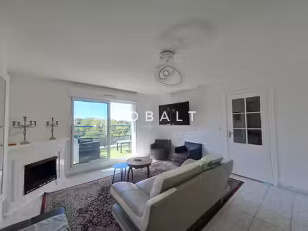 appartement - 80 m2 - 2 chambres - place de stationnement +