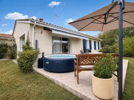 le confort du plain-pied avec 3 chambres  garage et jardin préservé
