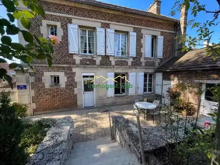 charmante maison en brique avec jardin  garage et fort poten