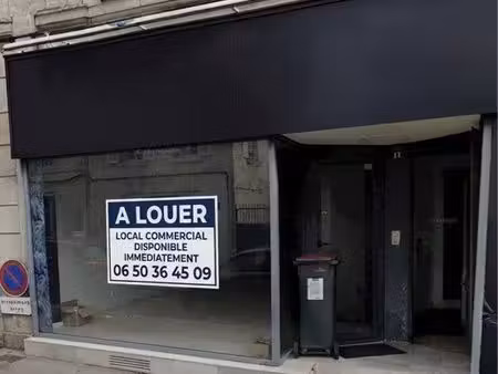 local commercial avec cave de stockage