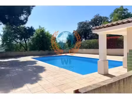 appartement en rez-de-jardin avec piscine et garage