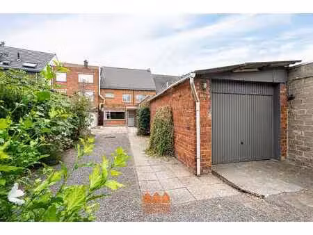 woonst met handelspand op 1423m² grond met 6 garages
