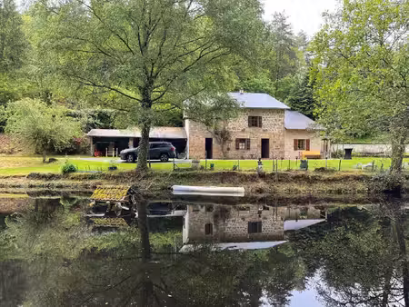 haute-vienne  une propriété avec étang au bord de la vienne