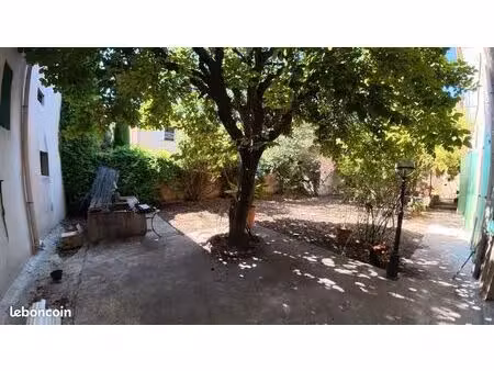appartement t4 avec 210m de jardin et 4 places de parking