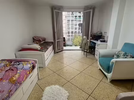 t3 traversant 64 m² – 5e étage avec ascenseur – balcon  cave et parking