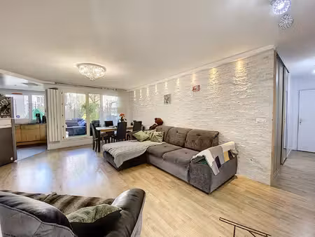 appartement traversant t4 80m2 avec terrasse et garage doubl