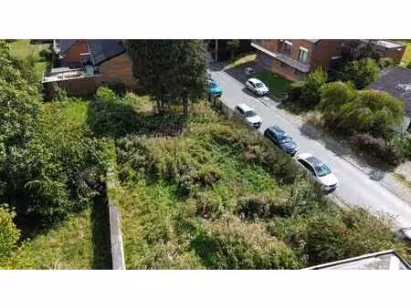 terrain avec permis en cours pour 2 appartements et garages