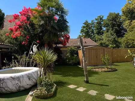 comme une maison au cœur d’un écrin de verdure avec terrasse et jardin arboré – 85 m² 5 mi