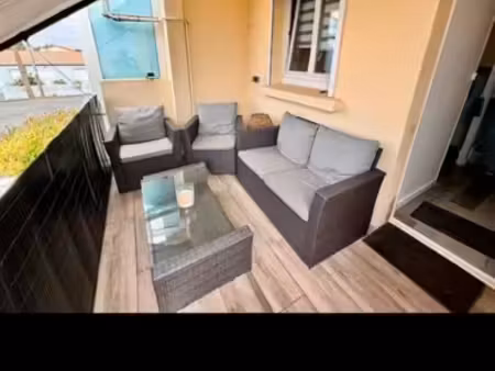 appartement de ville avec balcon et petit jardinet