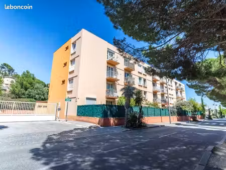 appartement traversant 57 m² - 2 chambres - parking sécurisé - à 10 minutes à pieds de la 