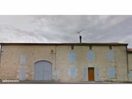 grande maison charentaise en pierre au cœur de tusson avec jardin et dépendances