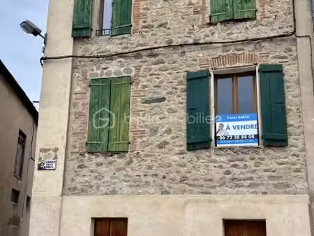 immeuble 12 pièces 150 m²