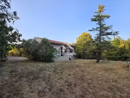 6920 m² de terrain constructible + maison