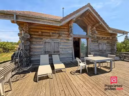 maison en rondins (fuste) proche précy sous thil 3 chambres avec jardin