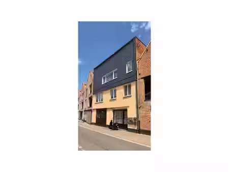 opbrengsteigendom met 7 appartementen + ruime garage-maga...