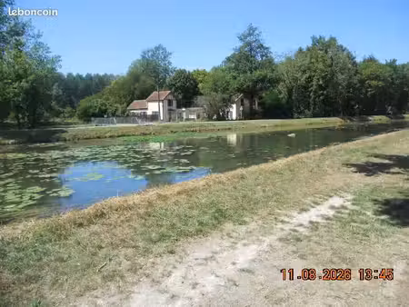 maison 60m2 terrain901m2 à 10m du ruisseau et vélo-voie canal. bras seine en fond de parce