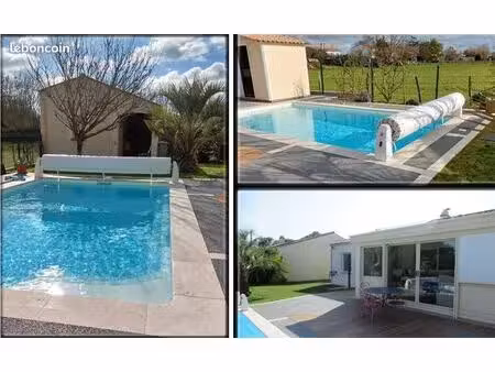 maison individuelle sur terrain de 538 m2 piscine panneaux solaire cheminée climatisation
