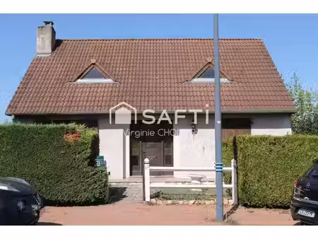 maison avec vie de plain-pied élevée sur sous-sol complet