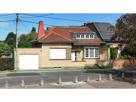 bungalow  3 façades  à moderniser  2 ch poss. 3  garage.