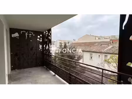 a narbonne sur le quai d'alsace- t3 lumineux avec terrasse et double parking !