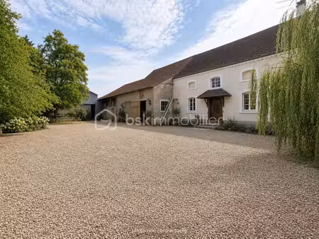 bel ensemble immobilier comprenant maison d'habitation  grange  hangar et terrain