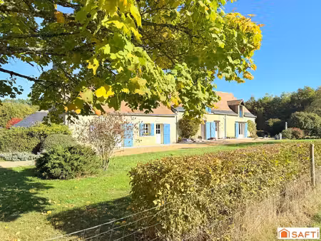 propriété de plus de 21 hectares  forêts et prés  avec une sublime longère et dépendance