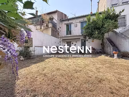 maison proche du centre-ville avec garage de 50 m² et jardin