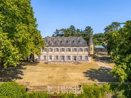 château des rozons à rénover avec dépendances et 5 hectares de terrain