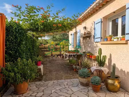 charmante villa de plain-pied avec jardin verdoyant et double garage