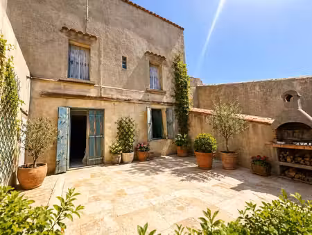 maison de 212 m2 avec local commercial + garage 95 m2 + terrasse azille