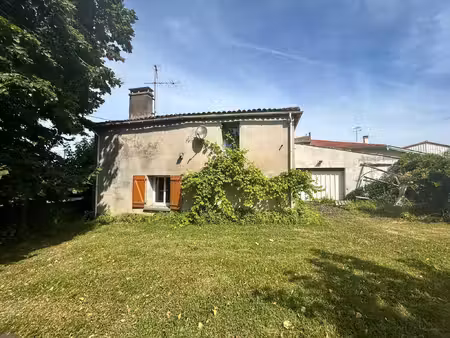 maison à rénover avec 4 chambres sur un terrain de 628 m2