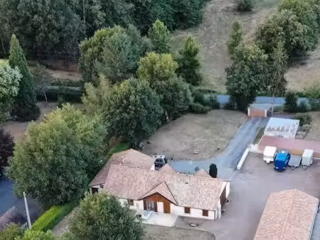 propriete foret de troncais 2 grands garages et dependances