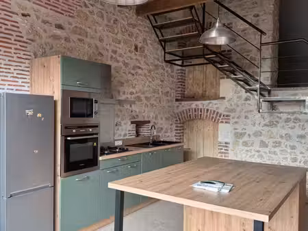 climatisé t2 en duplex  lumineux pierres apparentes
