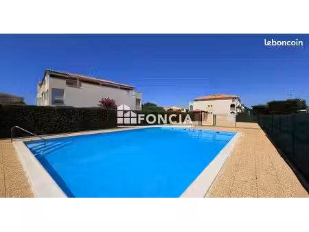 maison avec jardinet au cœur d'une résidence avec piscine