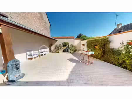 maison rénovée + parcelle avec double garage