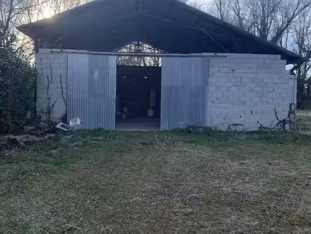 terrain avec cu constructible et hangar