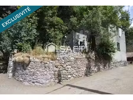 maison authentique  avec terrain/jardin de 300m2 situé juste en face
