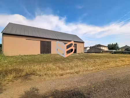 terrain avec grange offrant un fort potentiel d'aménagement