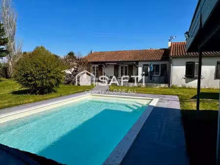 à vendre maison de plain-pied avec piscine et grand terrain