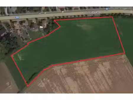 landbouwgrond van 255 a 64 ca – langs de provinciebaan te...