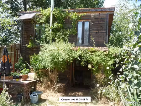 terrain avec cabane aménagée