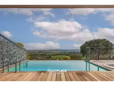 appartement de standing 3 pièces 100m² avec piscine et garages
