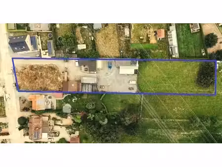 villabouw perceel van 41are 30 ca in woongebied met lande...